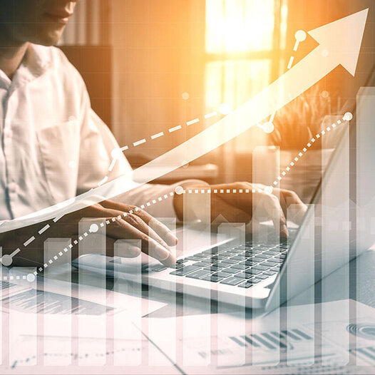 Data visualisations overlay on laptop